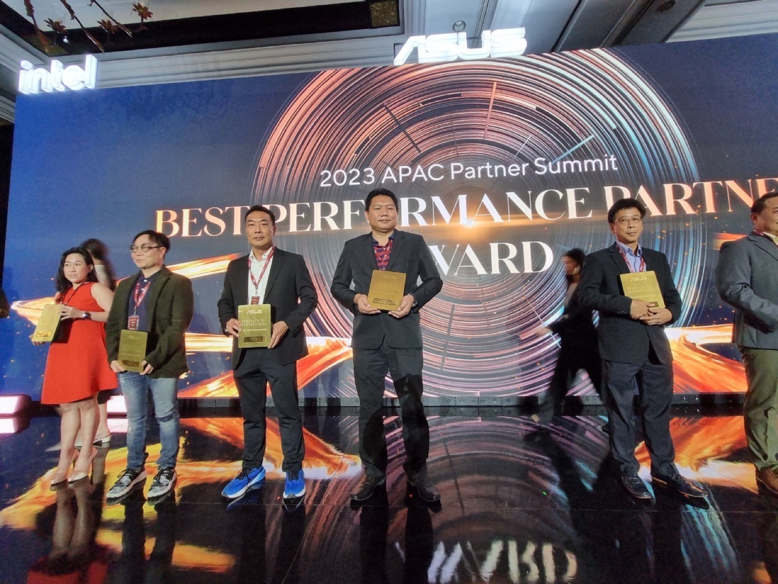 Receiving the ASUS International Partner of the Year award, 2024
